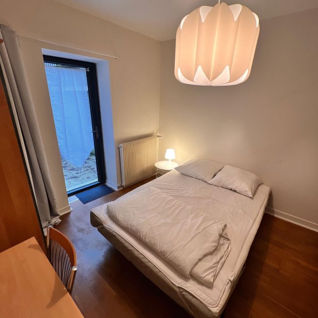 chambre-lit-double-location-appartement-la-bourboule